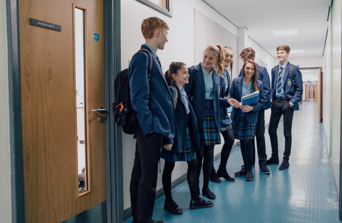 school children waiting outside class