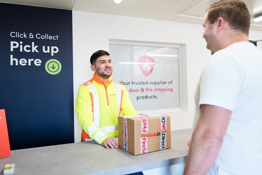 Advice Centre Featured Header – Click & Collect Man handing a parcel to customer