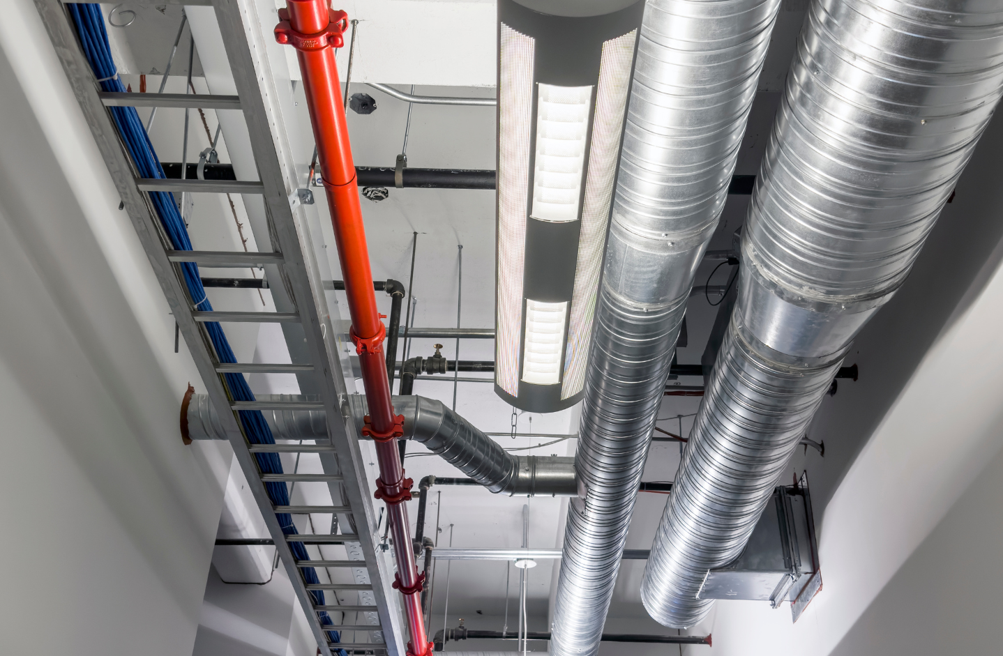 Pipes and cabling in ceiling